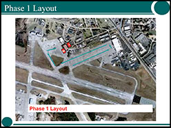 Slide showing an aerial view of an airport with shelter locations marked.