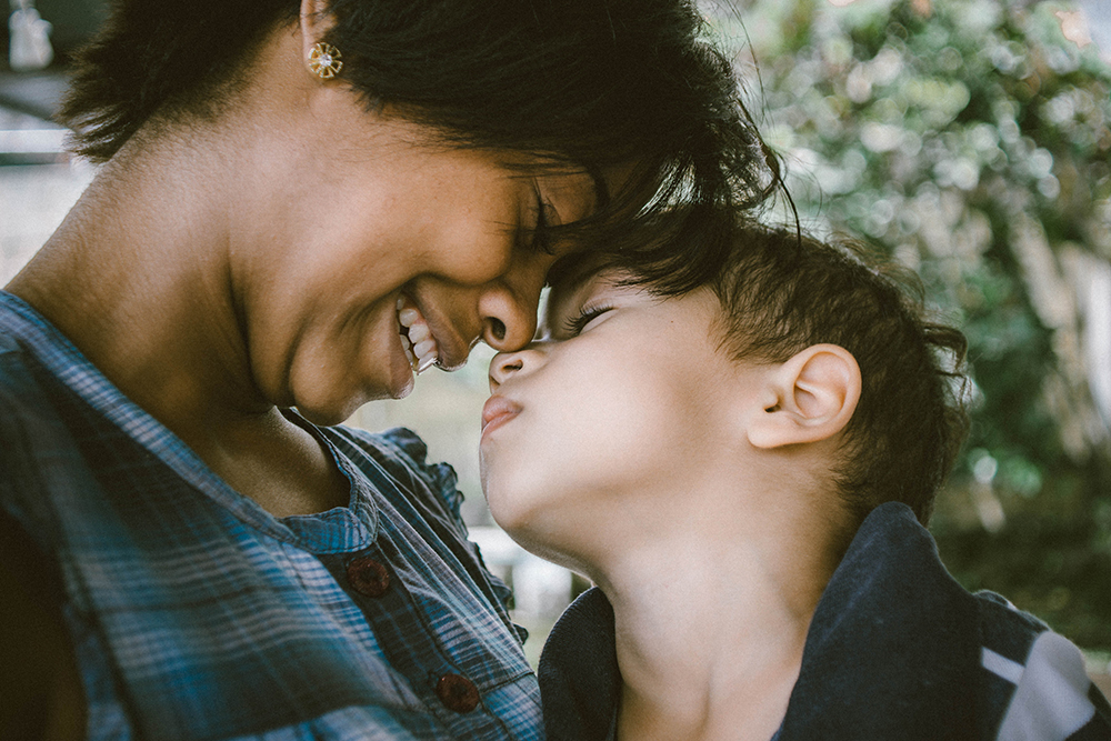 Photograph of a woman and young boy.