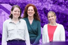 Photograph of evaluation team members smiling in front of purple background