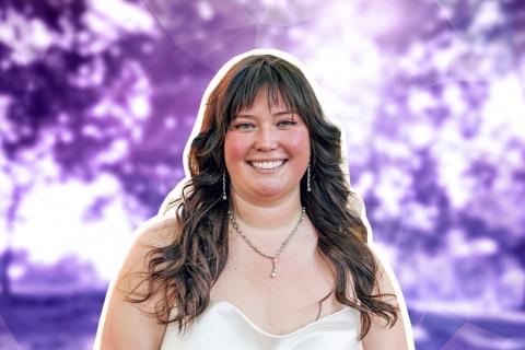 Photograph of Jessica with sun shining through purple background